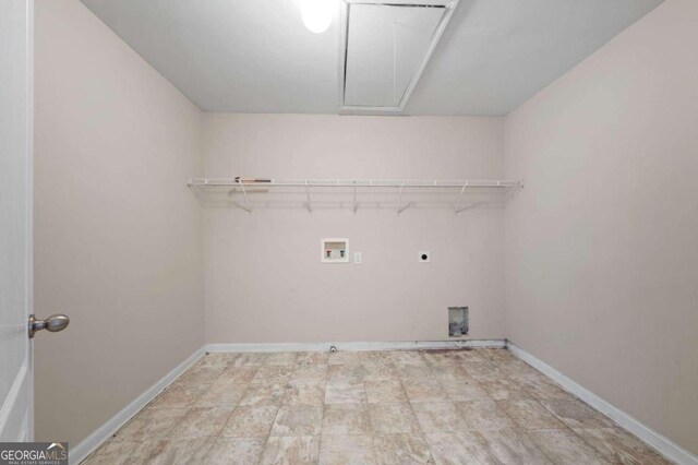 laundry area featuring light tile patterned floors, hookup for a washing machine, and electric dryer hookup