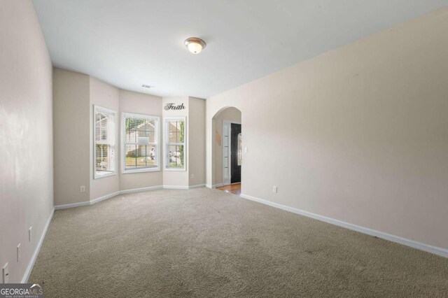 view of carpeted spare room