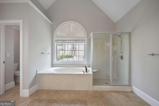 bathroom with vaulted ceiling, toilet, independent shower and bath, and tile patterned flooring