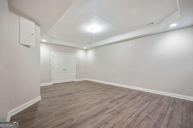 basement featuring dark wood-type flooring