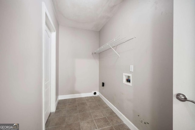 laundry room featuring tile patterned flooring, electric dryer hookup, and hookup for a washing machine