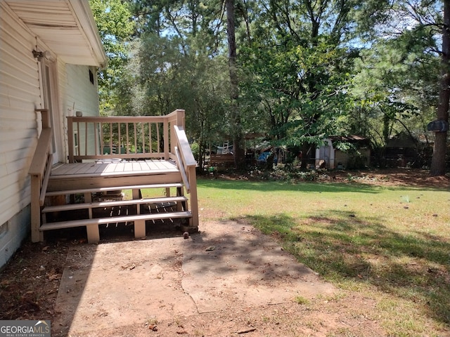 view of yard featuring a deck