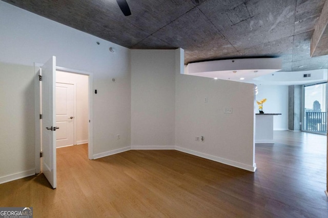 spare room featuring hardwood / wood-style flooring