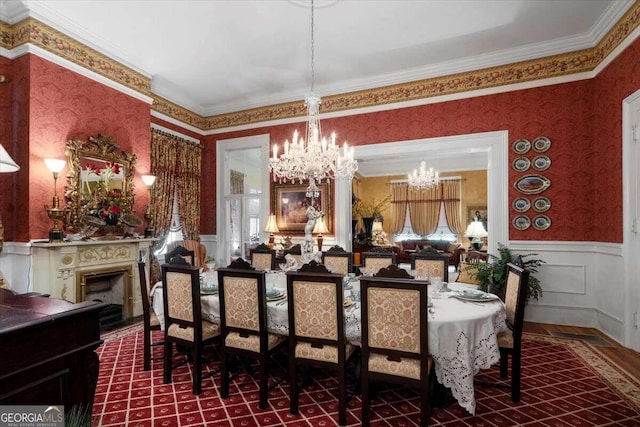 dining room featuring crown molding and an inviting chandelier