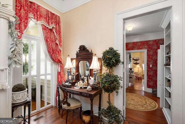 interior space with dark wood-type flooring and crown molding