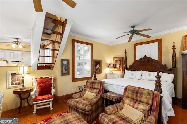 bedroom featuring ceiling fan, dark hardwood / wood-style floors, and crown molding