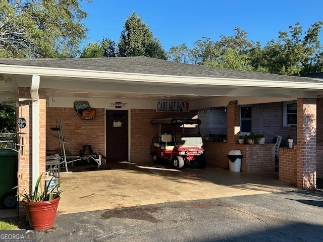 exterior space featuring a carport