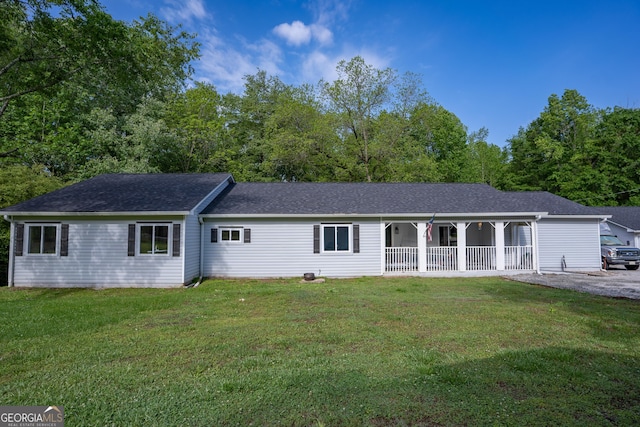 ranch-style house featuring a front lawn