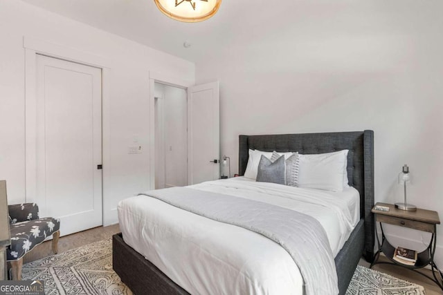 bedroom with wood finished floors