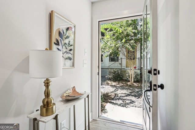 doorway to outside featuring hardwood / wood-style flooring