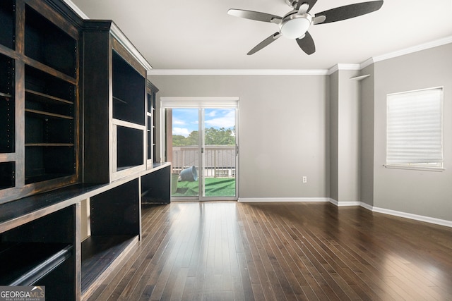 unfurnished room with crown molding, ceiling fan, and dark hardwood / wood-style floors