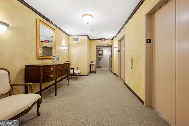 corridor featuring light colored carpet, crown molding, and elevator