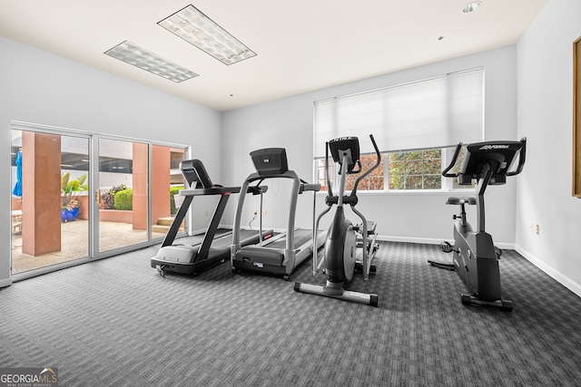 workout area with french doors and carpet floors