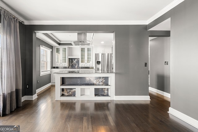 kitchen with stainless steel fridge with ice dispenser, dark hardwood / wood-style flooring, and white cabinets