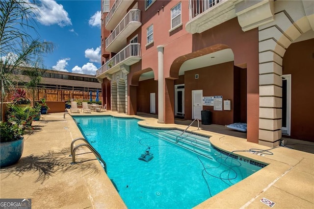 view of pool with a patio