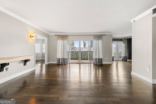 unfurnished living room featuring ornamental molding and dark hardwood / wood-style flooring