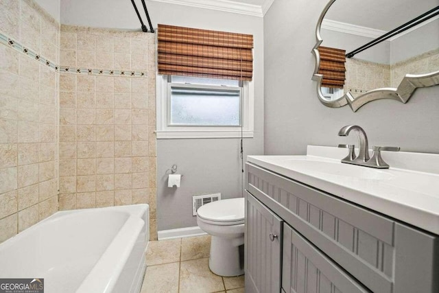 full bathroom with tiled shower / bath, tile patterned floors, toilet, vanity, and ornamental molding