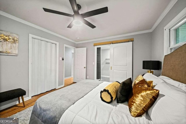 bedroom with crown molding, wood-type flooring, and ceiling fan