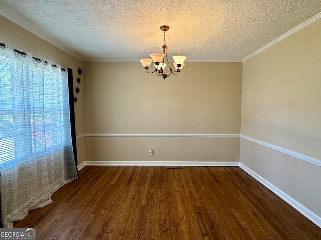 unfurnished room with crown molding, a textured ceiling, a chandelier, and dark hardwood / wood-style floors