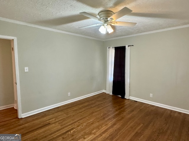 spare room featuring ornamental molding, dark hardwood / wood-style flooring, ceiling fan, and a textured ceiling