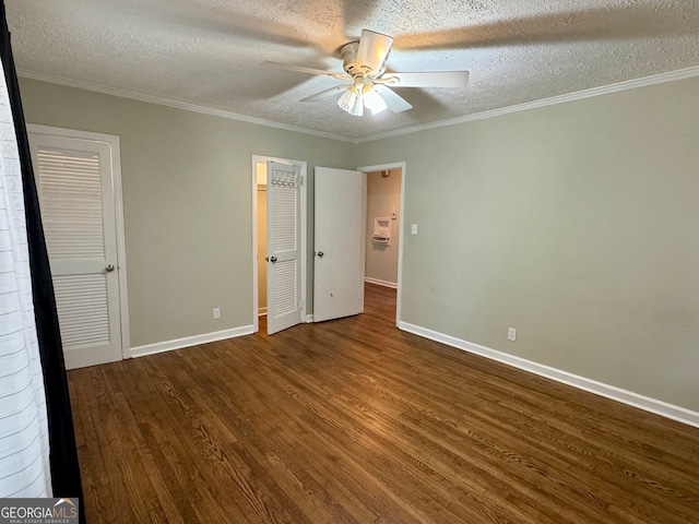 unfurnished bedroom featuring a textured ceiling, ceiling fan, and dark hardwood / wood-style flooring