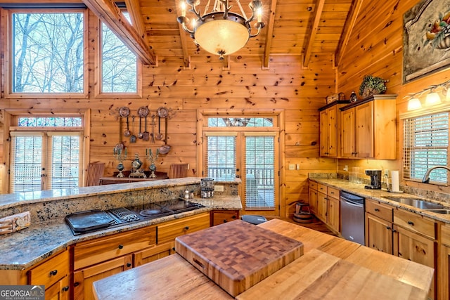 kitchen with wooden walls, dishwasher, sink, wood ceiling, and black cooktop