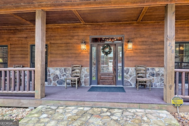 entrance to property with covered porch