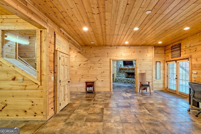 interior space with wooden walls and wood ceiling