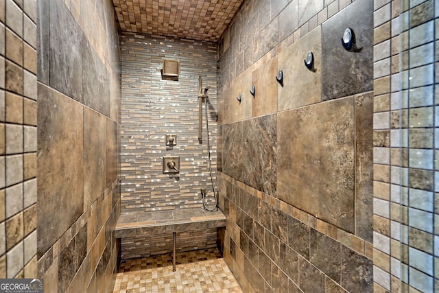 bathroom featuring tiled shower