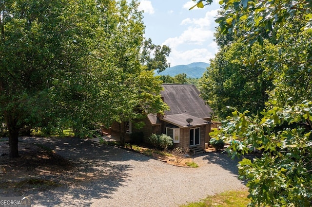 view of front of home with a mountain view