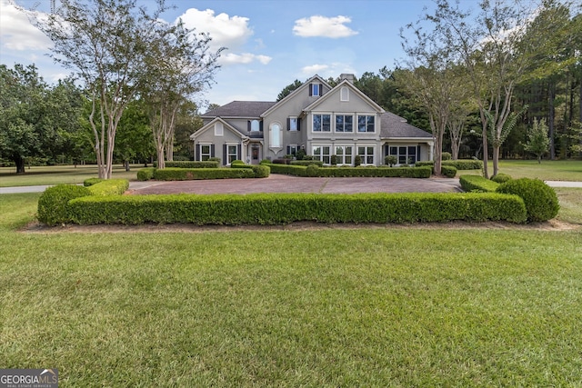 view of front of house with a front lawn