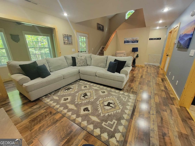 living room with dark hardwood / wood-style flooring