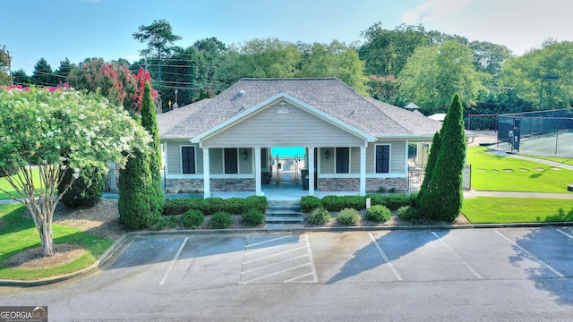 craftsman house featuring a front yard and a porch