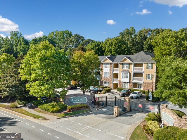 view of front of property with a balcony