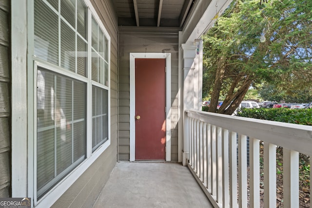 property entrance with a balcony