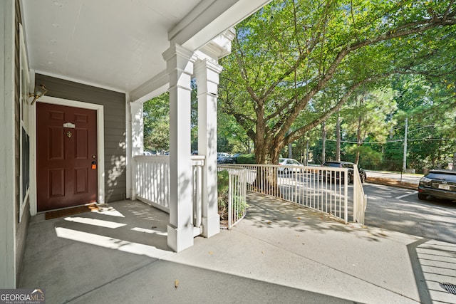 property entrance featuring covered porch