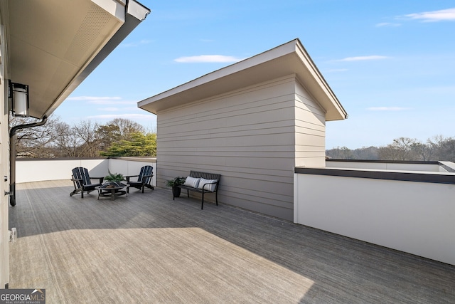 deck with an outdoor hangout area