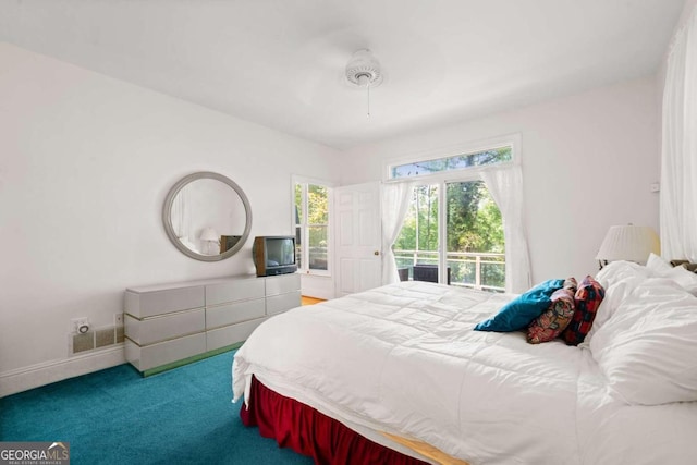 bedroom with ceiling fan, carpet flooring, and access to outside