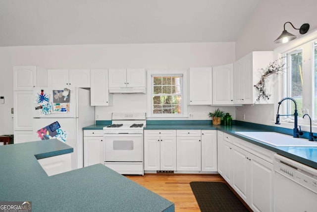 kitchen featuring white cabinetry, light hardwood / wood-style floors, sink, and white appliances