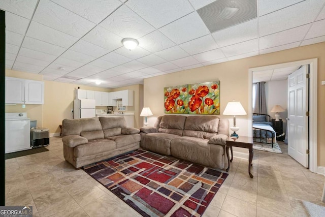 living room featuring washer / dryer