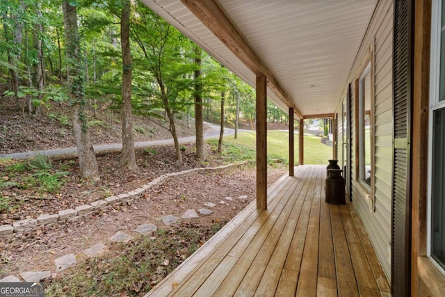 wooden terrace featuring a porch