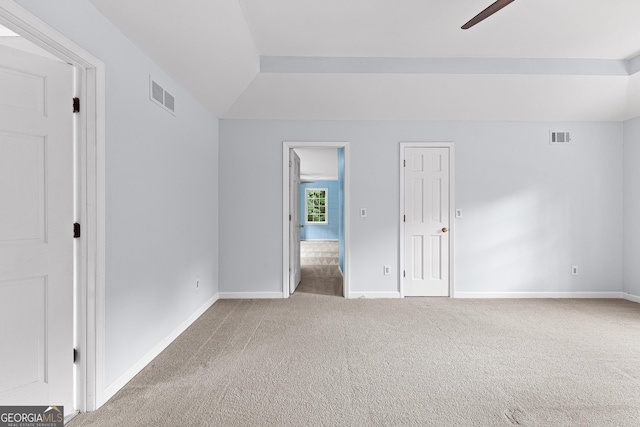 unfurnished bedroom featuring baseboards, visible vents, and carpet flooring