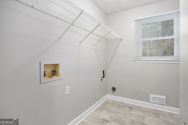 laundry room with washer hookup and hookup for an electric dryer