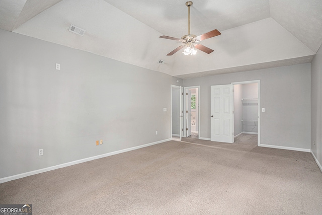 interior space featuring vaulted ceiling and ceiling fan