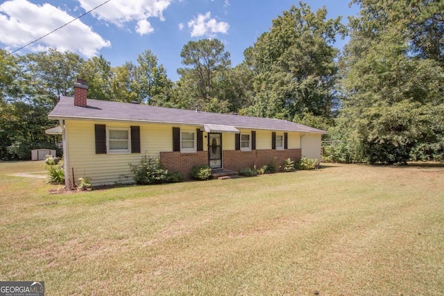 single story home with a front yard