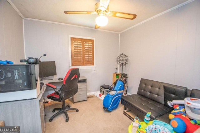 carpeted office space with crown molding and ceiling fan