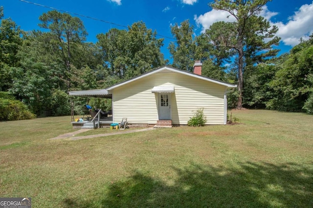 exterior space featuring a lawn