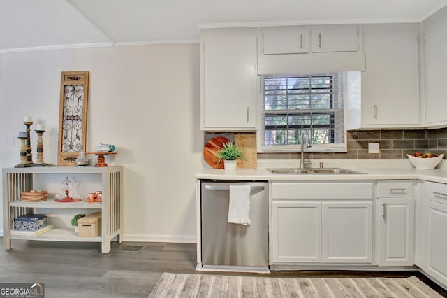 kitchen with dishwasher, hardwood / wood-style floors, sink, white cabinetry, and tasteful backsplash