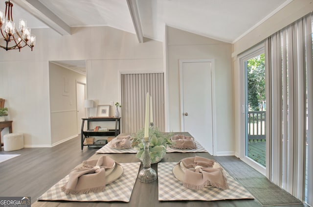 dining area with vaulted ceiling with beams, a notable chandelier, and hardwood / wood-style flooring