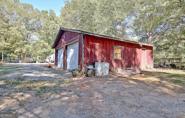 view of outbuilding featuring a garage